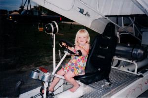 Mackenzie La Rue as a child in her father's truck